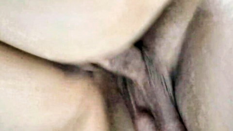 Close-up of wet shaved pussy with pubic hair in steamy shower cunnilingus