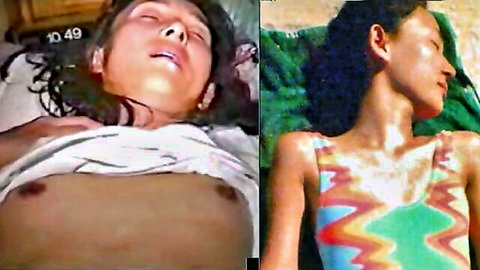 Busty Asian wife lying topless on bed with exposed tits and Black woman in colorful bikini top on lounge chair