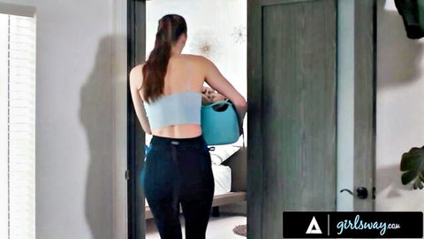 Skinny blonde ponytail girl in tight black leggings showing round ass carrying blue laundry basket