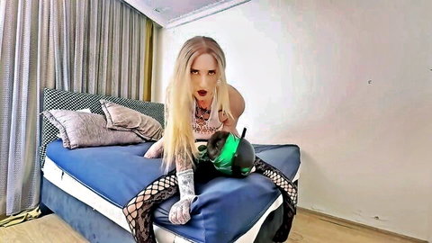Rylee Blake Carter in black fishnets and gloves, seductive pose with toy