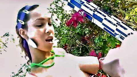 Busty Latina teen slut with cum on face in garden, seductive pose