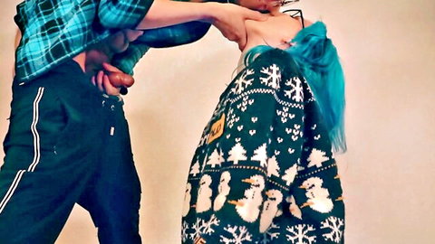 Teal-haired babe in ugly Christmas sweater deepthroats thick cock while man chokes her neck