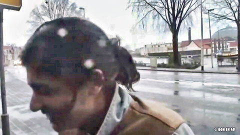 Indian man in ponytail on snowy street in amateur adult video