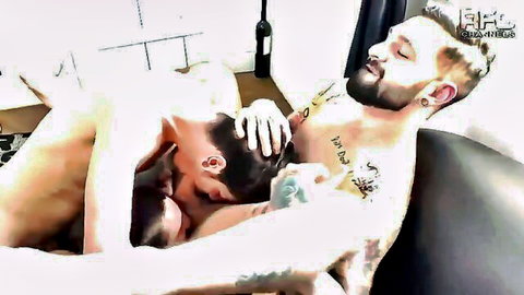 Tattooed muscular hunks in gay threesome anal fuck on couch with intense pleasure
