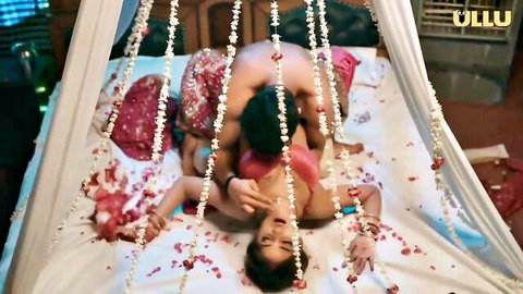 Indian babe in red saree passionately fucked missionary on flower petal bed by lover