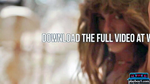 Sensual blurred Playboy babe closeup with full video download promo overlay