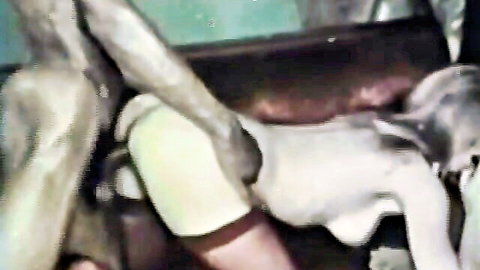 Blonde in stockings fucked doggy style by big black cock in retro interracial scene