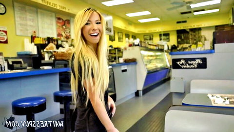 Kenzie Reeves as broke college cutie smiling in diner uniform