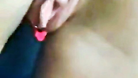 Close-up of wife's exposed pussy with pink heart during outdoor sex