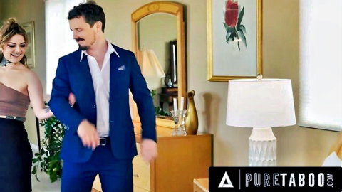 Handsome man in blue suit embraces sexy brunette woman in off-shoulder top and skirt, Pure Taboo