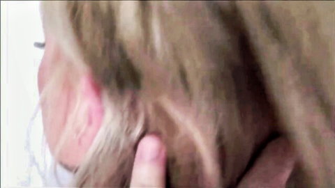 Parker Swayze blonde MILF close-up, hand touching neck intimately