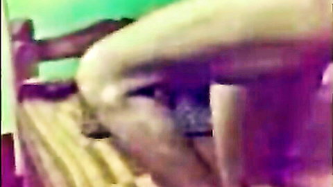 Blurry close-up of cute shy Mumbai girlfriend embracing man on cam
