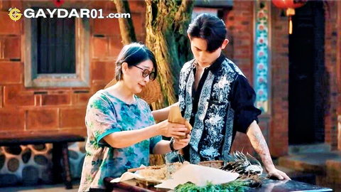 Asian woman and man in floral dress and vest prepare herbs in steamy threesome setup