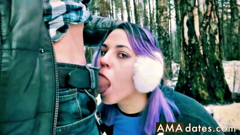 Purple-haired girl gives public blowjob in snowy park with ear muffs