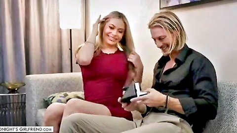 Nicole Aria in red dress with Ryan McLane on intimate couch date