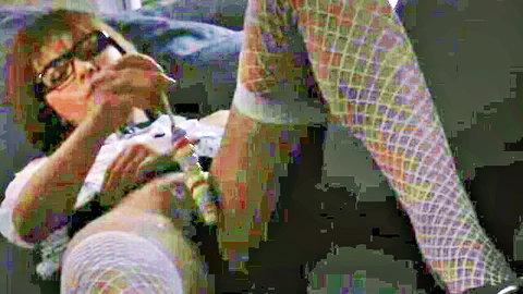 Tsubasa Akimoto in glasses and fishnet stockings teasing crotch