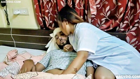Hot Indian nurse passionately kissing injured patient in bed