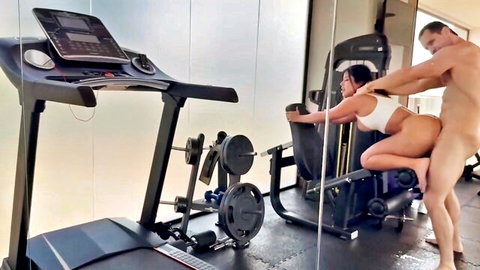 Flexible Latina in white workout gear lifted and fucked with legs split in gym