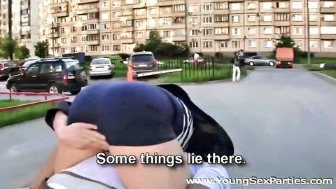 Outdoor young sex party scene in urban area with participants