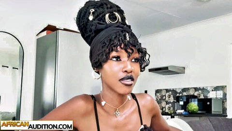 Petite ebony African teen in first casting, seductive pose with big curls