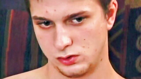 Jamie shirtless close-up, intense gaze in self-sucking jerk off solo video