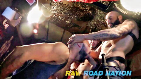 Two dominating muscular bearded tops grab submissive guy in raw gay threesome