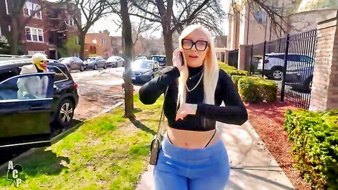 Alexis Andrews blonde curvy model walking in crop top and tight pants on Chicago street