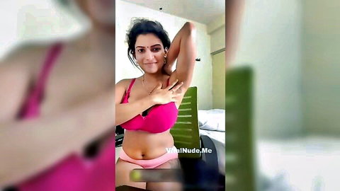 Resmi R Nair in pink lingerie posing seductively solo