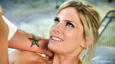 Candee Licious smiles as man grips her neck in steamy honeymoon pose