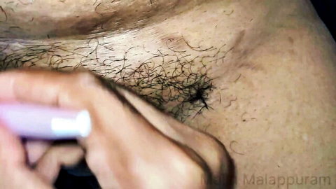 Mallu Malappuram shaves her hairy Indian pussy up close