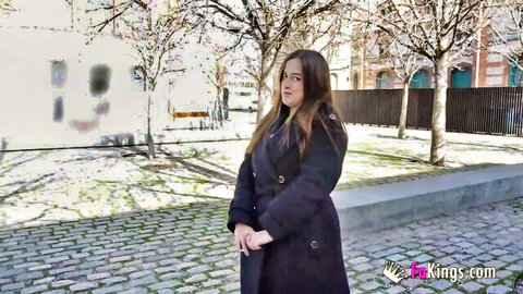 Marta B in long black coat outdoors, curvy brunette with big tits and ass