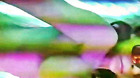 Busty amateur watching herself in solarium, tasting on cam with natural big tits