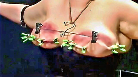 Mature BBW with huge natural tits clamped in BDSM hanger setup