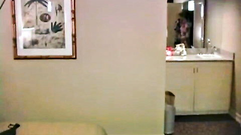 Scarlet in hotel bathroom for BDSM slave spanking and squirting torment