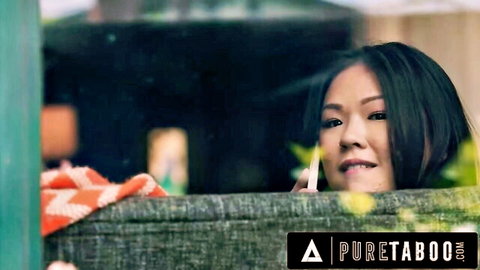 Dana Vespoli smiling through window on phone in Pure Taboo scene