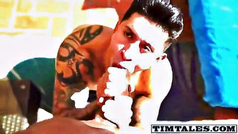 Tattooed white hunk gives sloppy BJ to BBC with facial cumshot