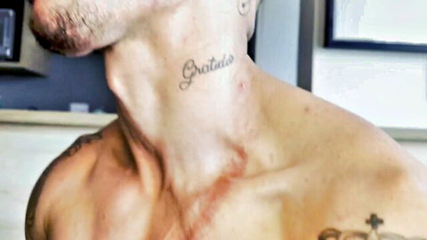 Samuel Hodecker tattooed neck and shoulder close-up in gay scene with Lucas Dias