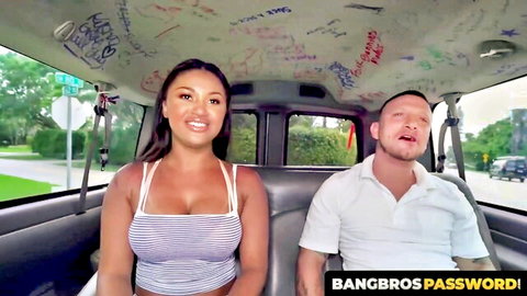 Alice Andrea smiling in van with natural big tits in striped top - BangBros