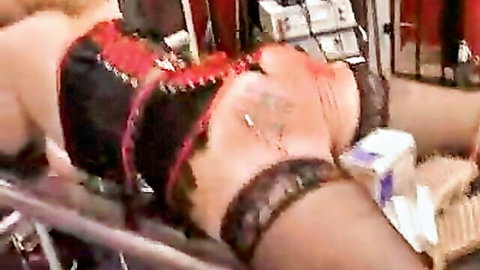Bound BBW in red-black lingerie exposes spanked red ass on BDSM bench