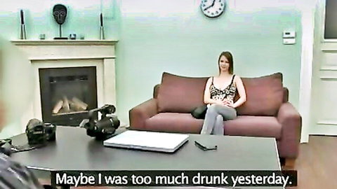 Hot 18-year-old brunette babe casually posed on couch before stripping nude