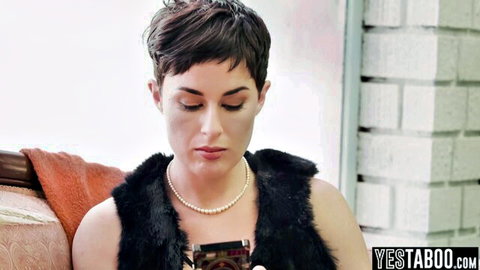 Mistress Alexis, petite ebony MILF in seductive black fur vest with pearl necklace