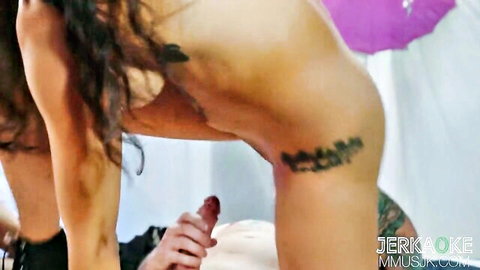 Tattooed brunette bent over nude as guy grips her hip with thick hard cock ready to fuck doggystyle