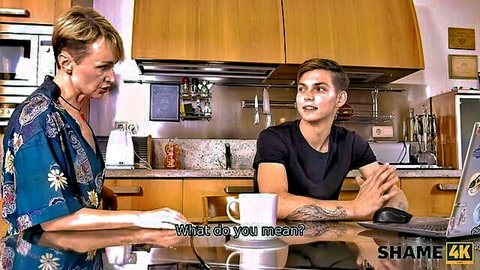 Mature Cherry Aleksa confronts young man in tense kitchen moment