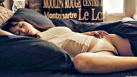 Marilyn Mansion seductively sleeping in white lingerie, revealing pose