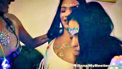 Glittery babes in skimpy outfits teasing and touching closely at Bang My Besties party