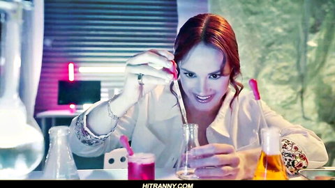 Redhead beauty in open lab coat conducting sexy science experiment