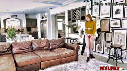 Redhead Lauren Phillips in sheer top and panties with another woman in luxurious home