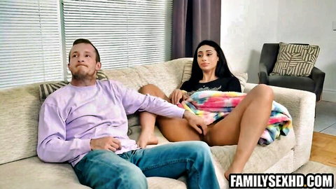 Latina babe spreads legs wide fingering pussy under blanket on couch with horny guy