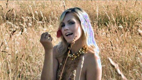 Blonde babe teasing in field, pro striptease in golden grass