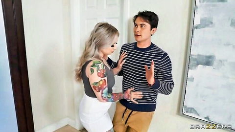 Tattooed blonde MILF in tight skirt confronts handsome guy in striped sweater